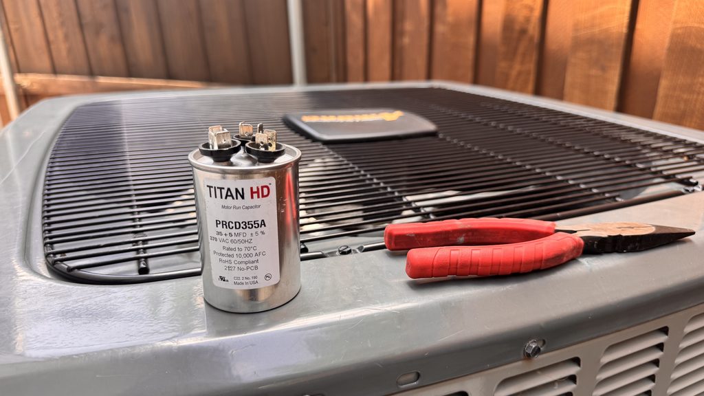 Dual run AC capacitor used in residential air conditioner